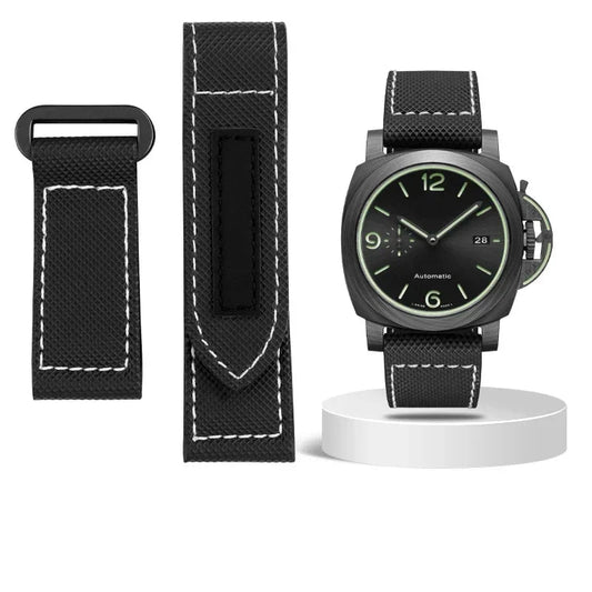 Black watch with strap and tools on a white background